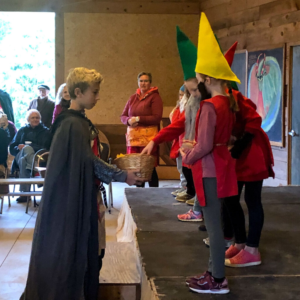 students in michaelmas pageant at charlottesville waldorf school pavilion