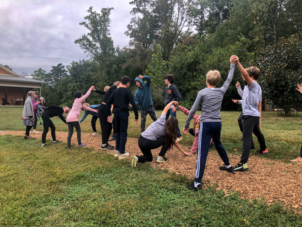 students completing tasks as part of Michaelmas celebration at Charlottesville Waldorf School