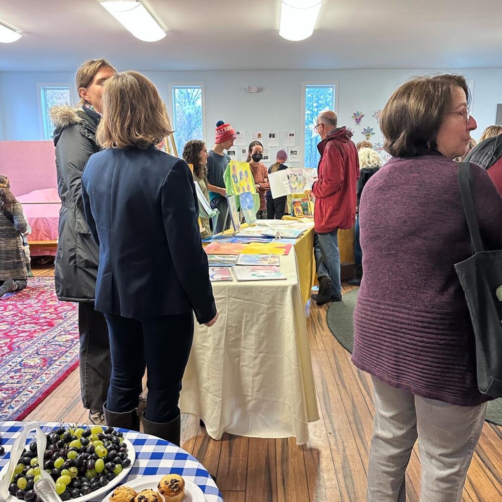 families visiting in the music and arts room for Friends and Family Day at CWS
