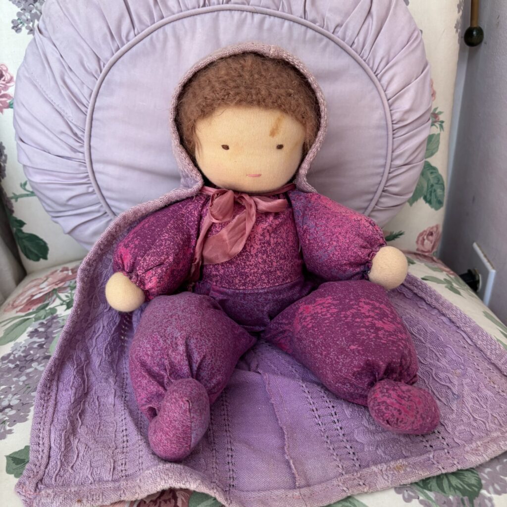 Waldorf baby doll with a purple cloak Lisa Olko