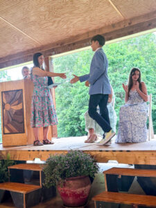 student receiving diploma