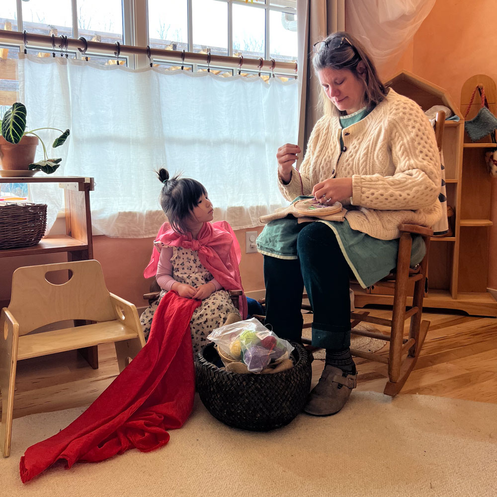 young child with teacher in early childhood