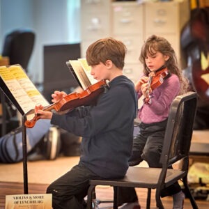 3rd grade students learning violin