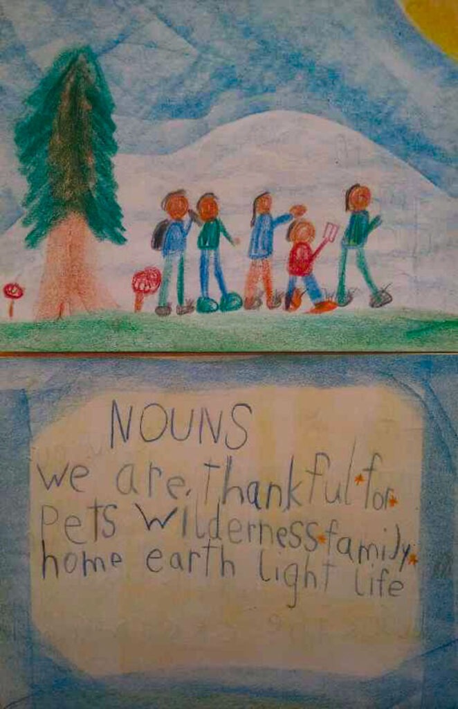 we are thankful drawing and writing by second grade student