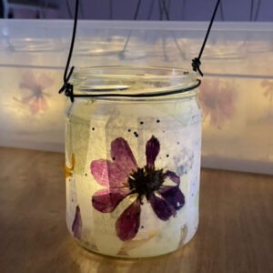 simple jar lantern with a dried flower