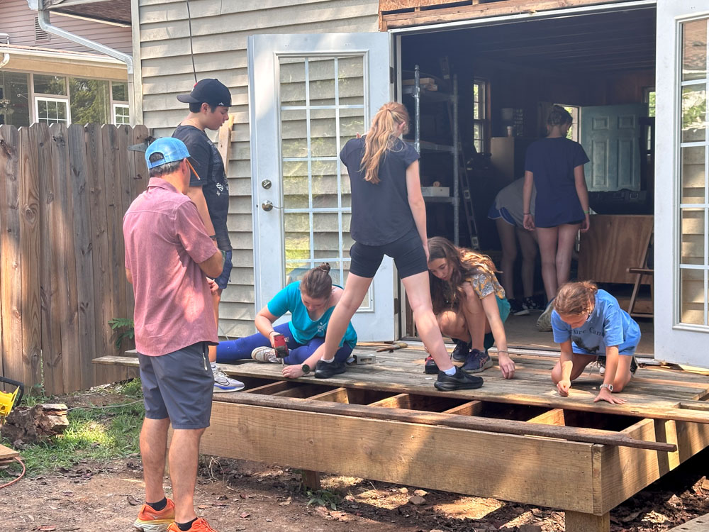 Waldorf middle school students building a deck