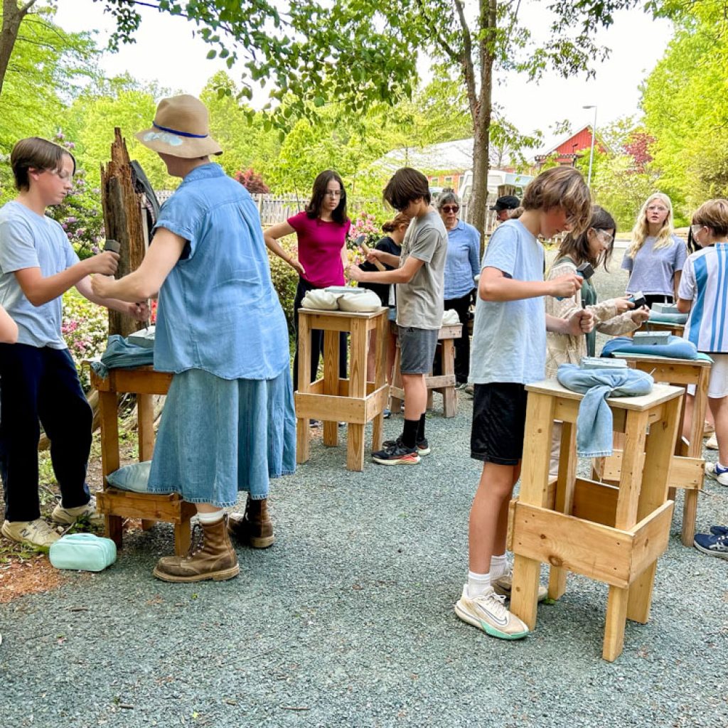 Charlottesville Waldorf School students learning about stone carving