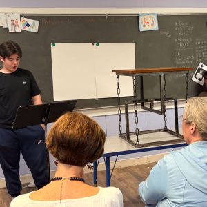 (CWS) Grade 8 student presenting Passion Project about learning to weld and making a gravity table